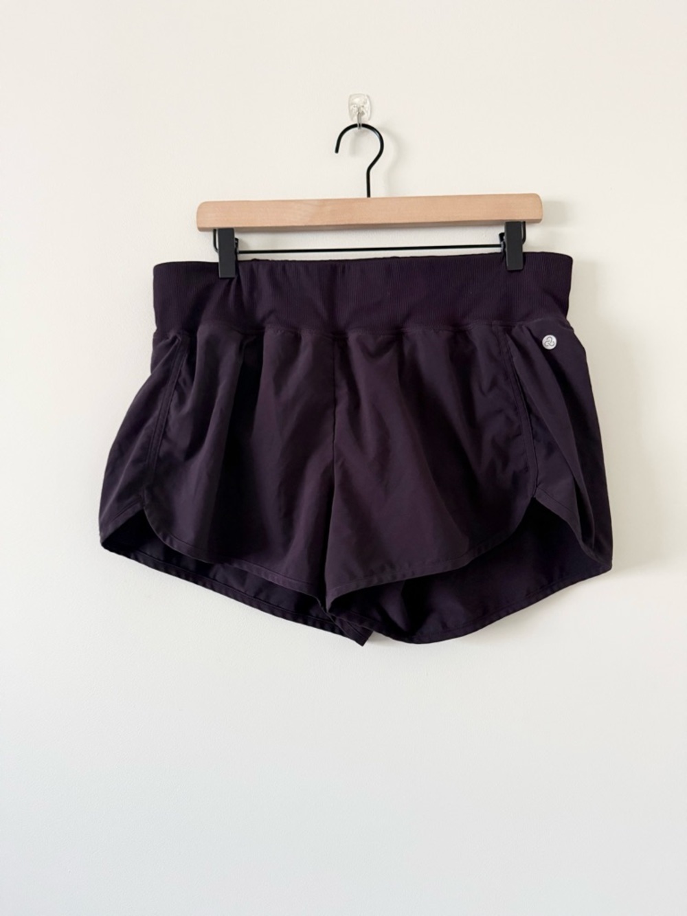 Zella Deep Plum Athletic Shorts with Curved Hem Waist Band Pocket Lined Size L